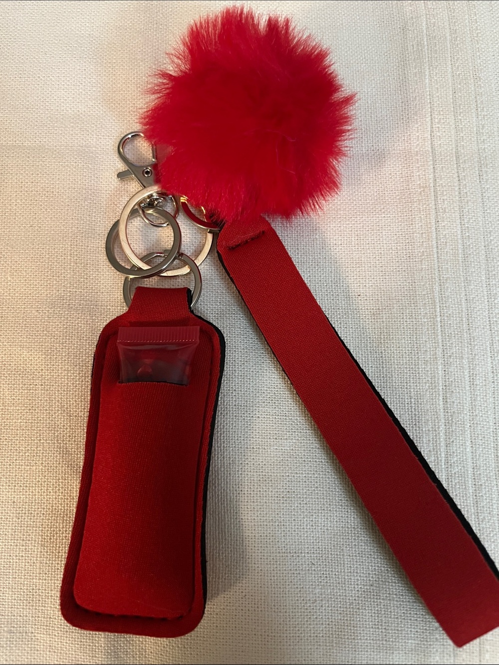 Red Pom Pom Keychain Wristlet with Lip Balm Holder